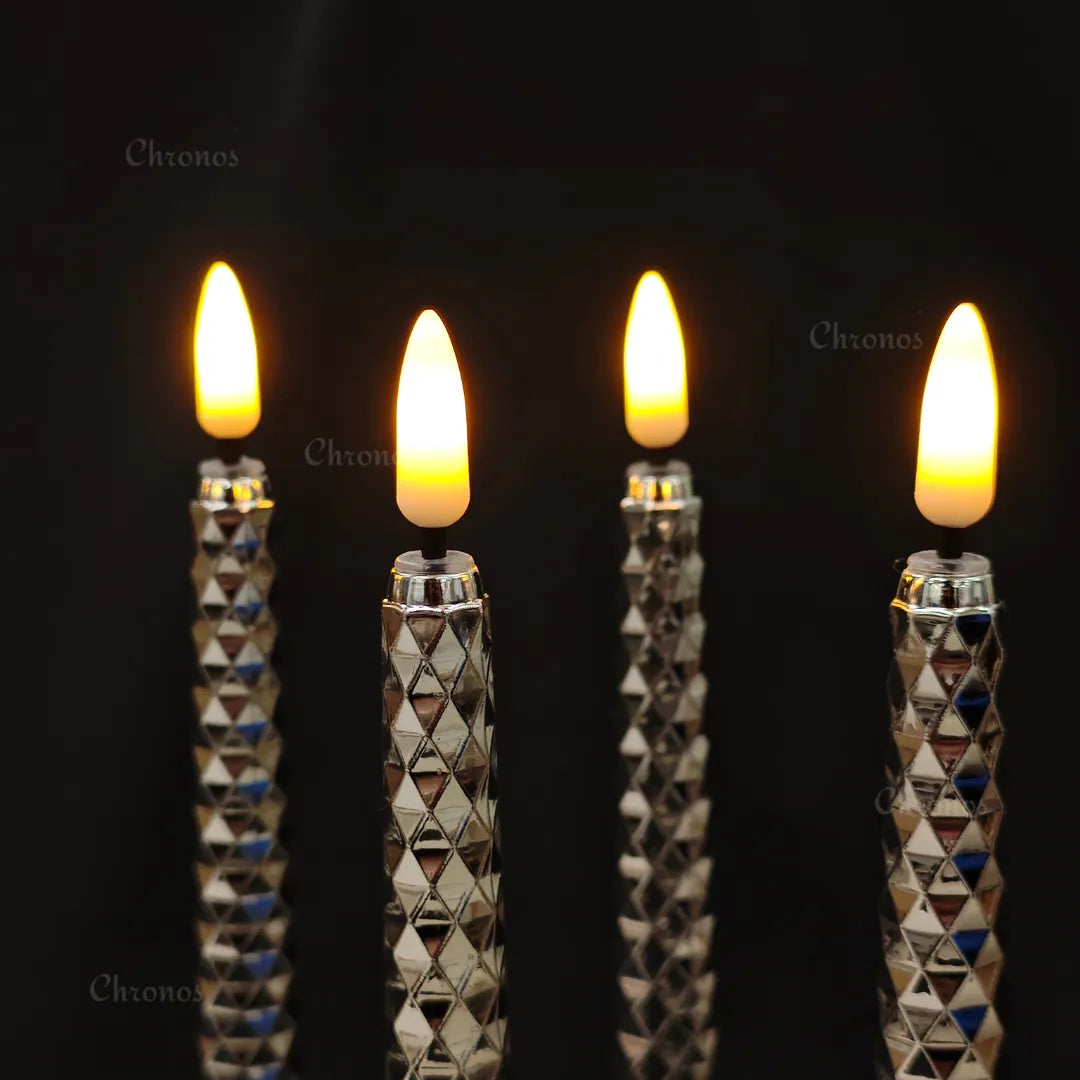 LED flameless taper candles used as wedding table centrepiece decoration