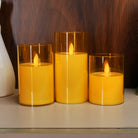 Battery-powered Acrylic Golden Glass LED Pillar Candle with realistic flame for indoor décor