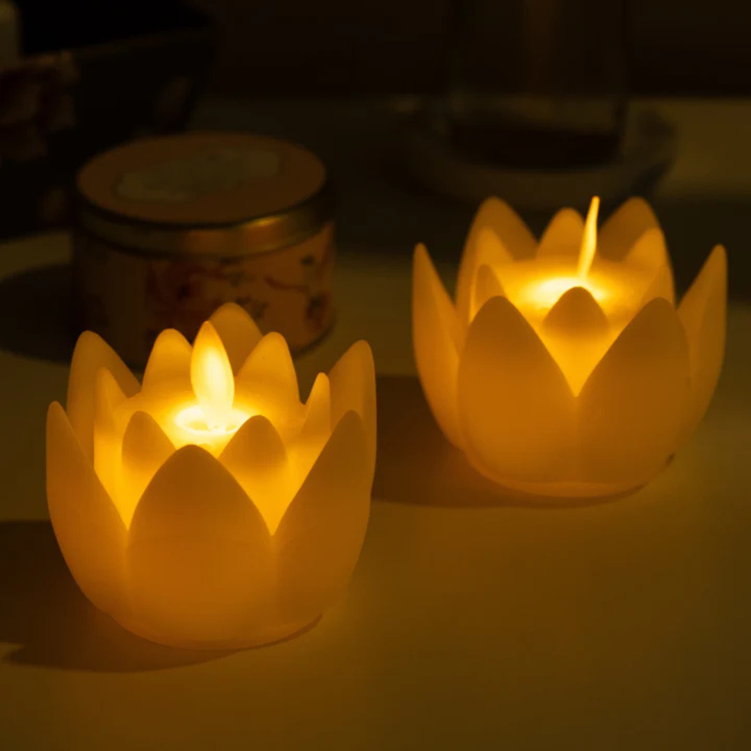 Battery-operated LED Lotus Flower Tealight Candles emitting a colorful, flickering glow—ideal for weddings, events, and spiritual décor.
