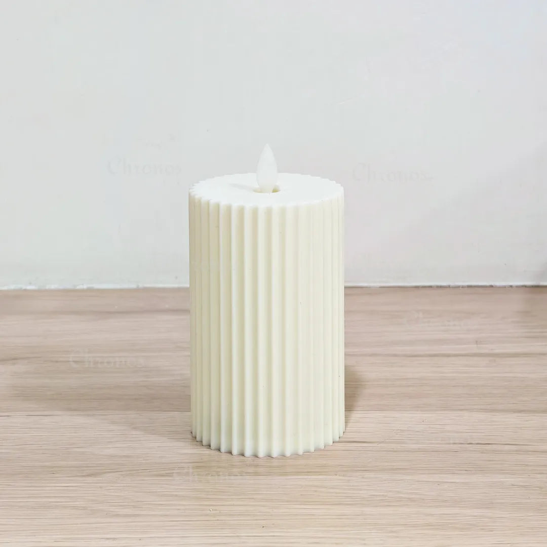 Battery operated pleated LED pillar candle