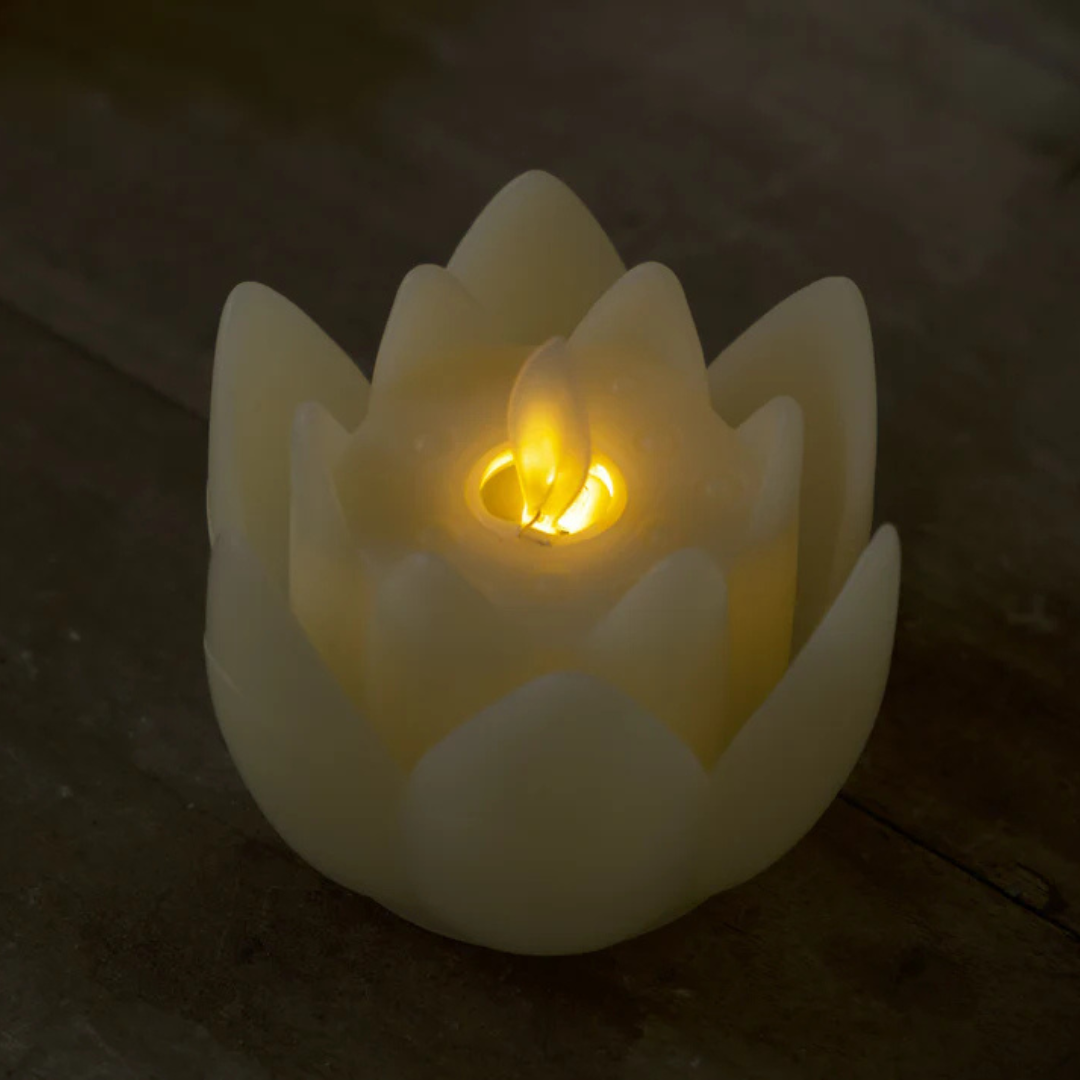Elegant LED Lotus Flower Candles for festivals, meditation spaces, and gifting, featuring a realistic flame effect with battery-powered operation.