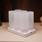 Flameless LED tea light candles with frosted holders for a warm, natural flickering glow.