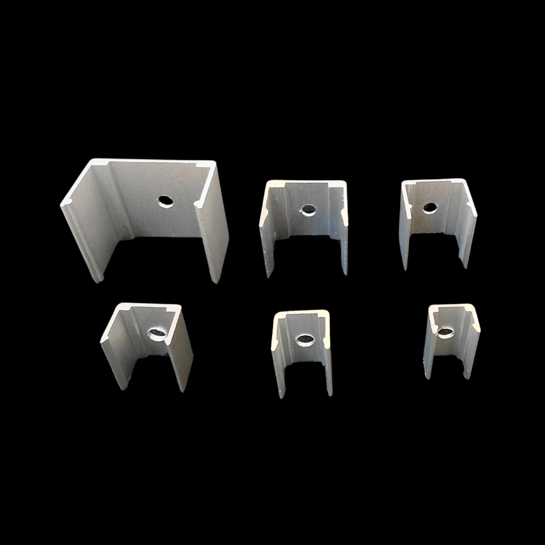 Accessories: silicone end caps and metal clips for flexible LED channel.