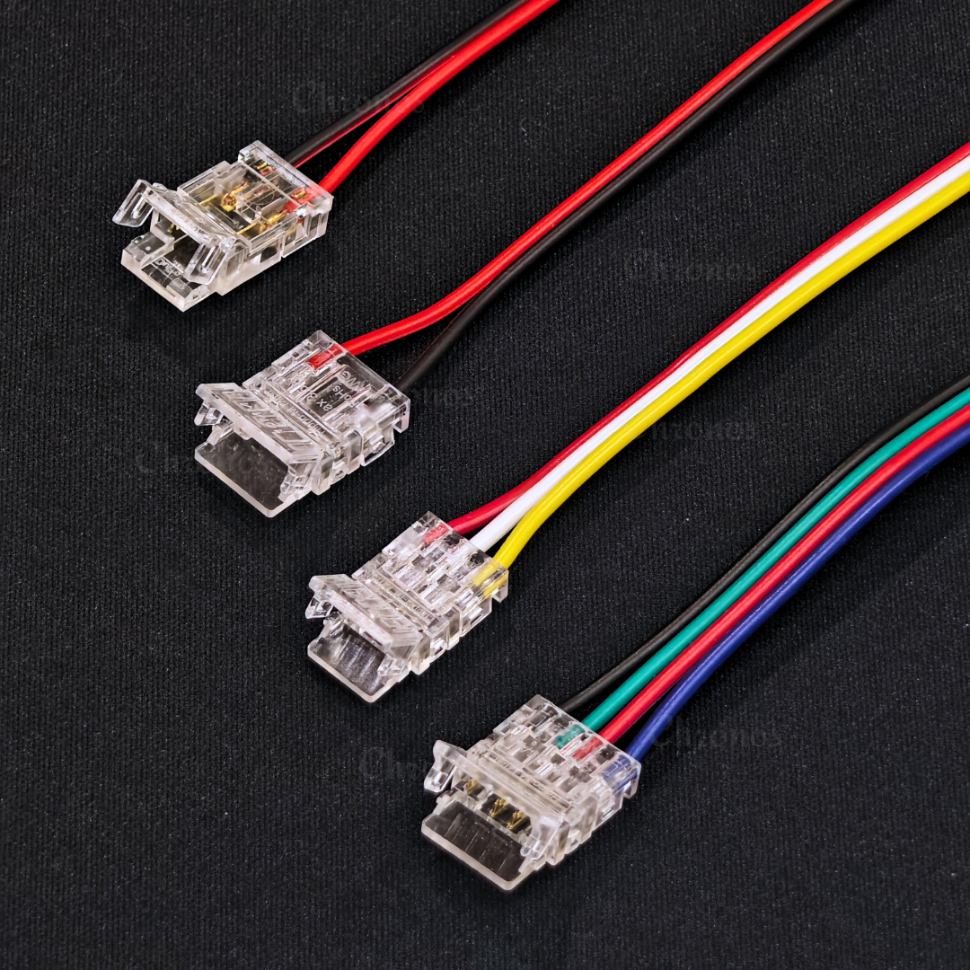 Wire-to-strip connector linking LED strip to power supply.