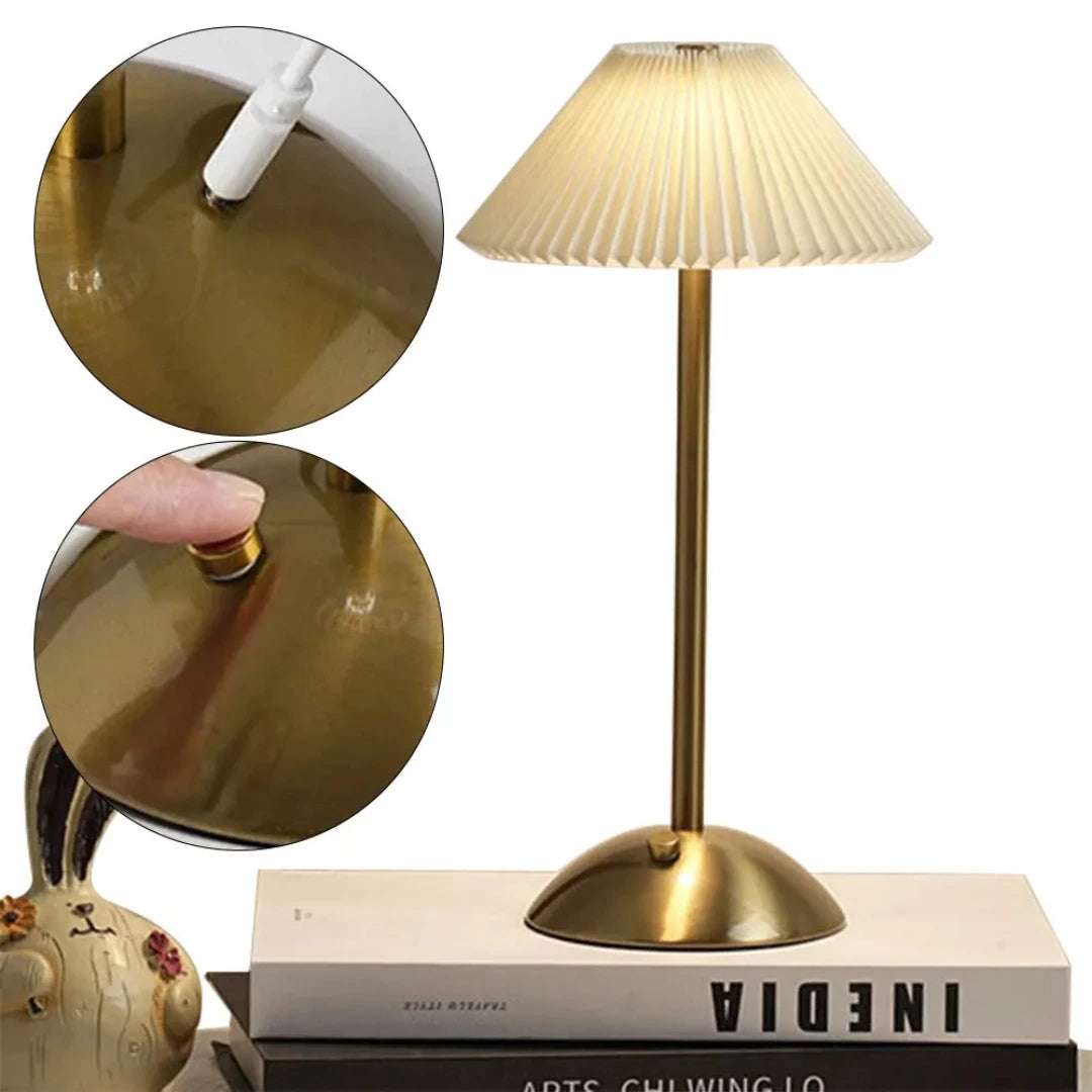 Elegant Velora LED lamp with ivory pleated fabric shade by Chronos Lights, designed in Mumbai for stylish interior lighting.    |