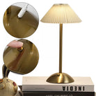 Elegant Velora LED lamp with ivory pleated fabric shade by Chronos Lights, designed in Mumbai for stylish interior lighting.    |