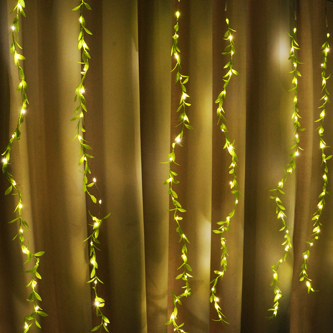 Wedding and photo booth green leaves curtain lights with warm LED illumination – Chronos Lights