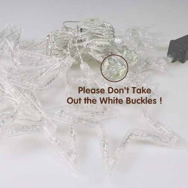 Curtain string lights with large and small stars in warm white LED for magical décor