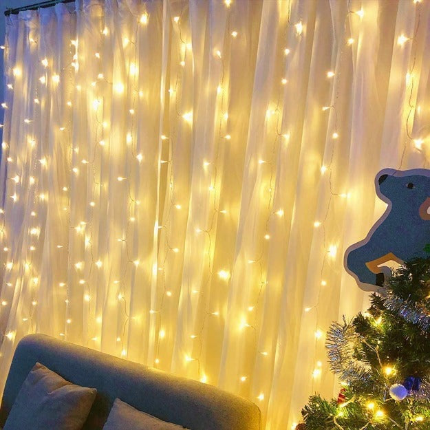 Warm white LED curtain lights for Ganpati pooja and festival backdrops