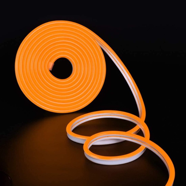 Add a bold touch to your interior with this orange neon LED strip light for walls, ceilings, and furniture