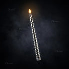 Close-up of diamond-cut metallic finish on decorative LED taper candle