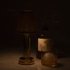 Filo rechargeable LED table lamp providing soft warm white ambient lighting