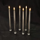 Warm white LED taper candles creating romantic candlelight dinner ambience