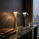 Stria Slim rechargeable table lamp providing soft warm white ambient illumination