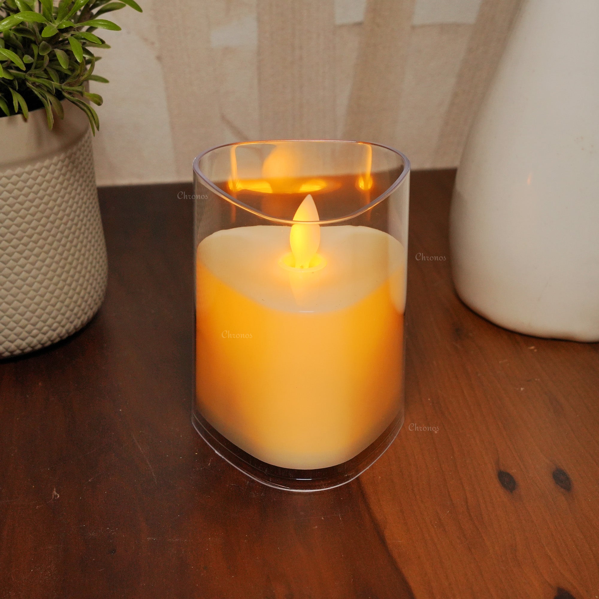 Elegant triangular LED pillar candle with a realistic moving wick and durable acrylic glass design.