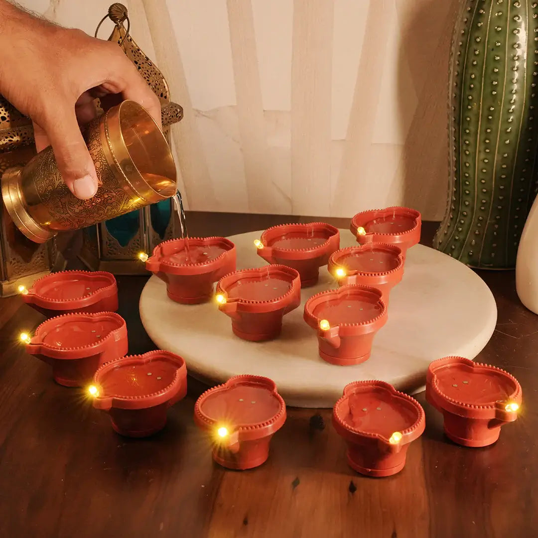 Battery-Powered LED Diyas with Water Sensor Technology – Safe, Smokeless, and Flameless Lighting for Festivals – Chronos Lights