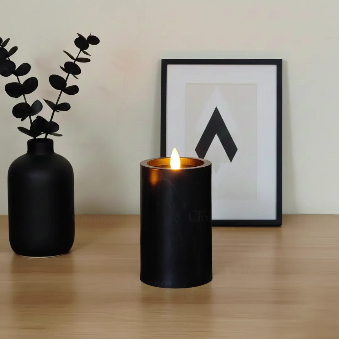 Black marble LED moving wick candle on dining table setup