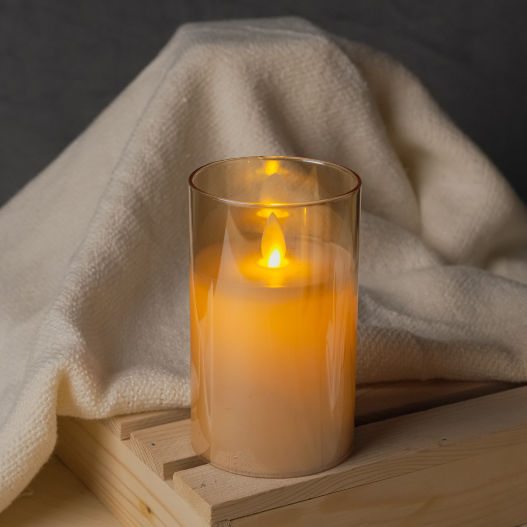 Golden glass LED pillar candle for Christmas decorations and holiday ambiance
