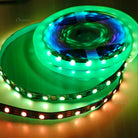 RGBIC strip mounted along the underside of a gaming desk setup