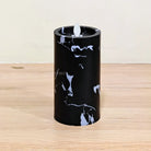Decorative black LED candle enhancing modern home interiors