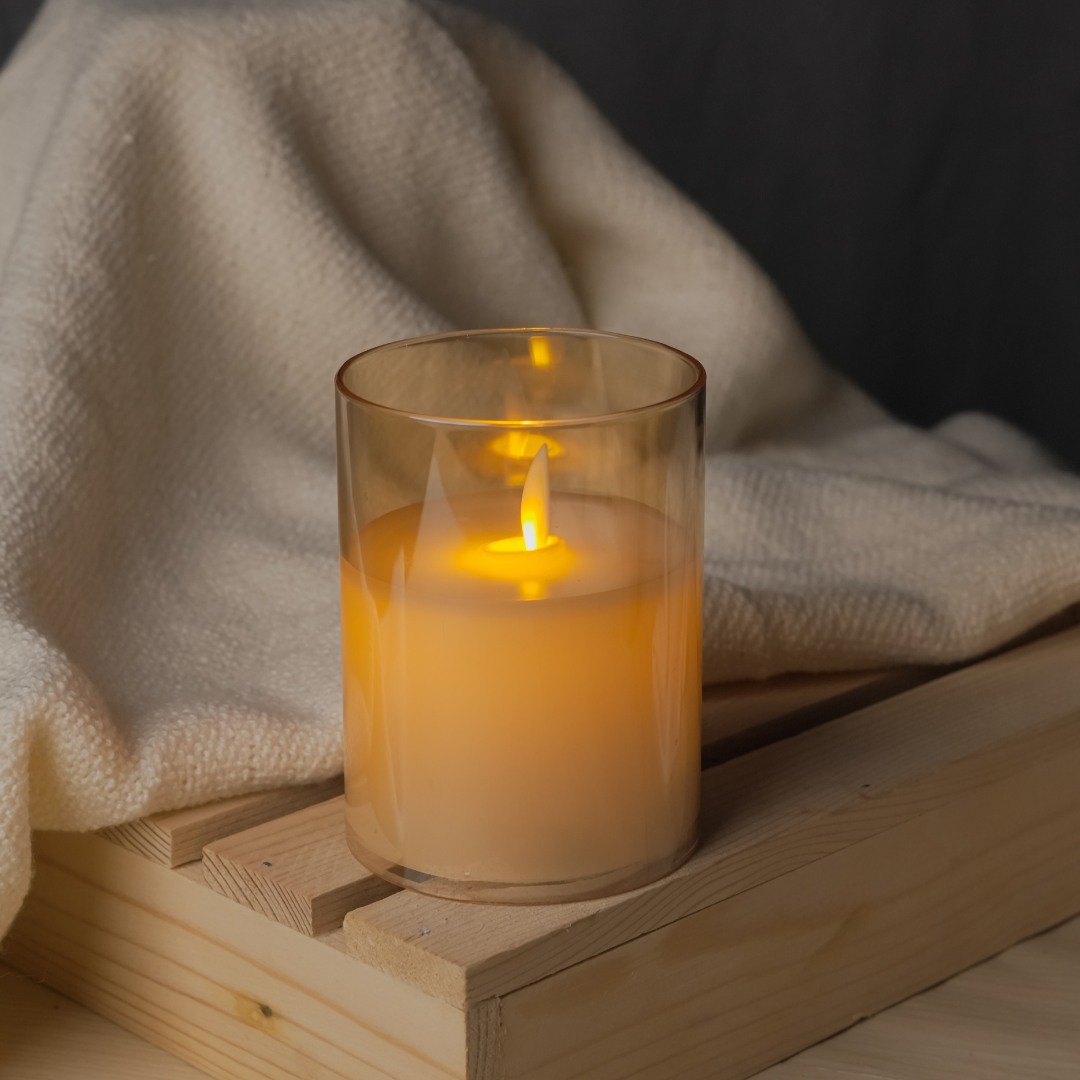 Golden LED pillar candle with moving flame, perfect for Diwali pooja and décor
