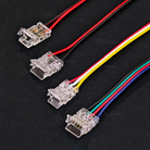 Wire-to-strip connector linking LED strip to power supply.
