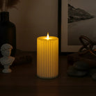 Pleated ivory LED candle for table and shelf decor