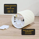 Pleated LED pillar candle styled for living room decor