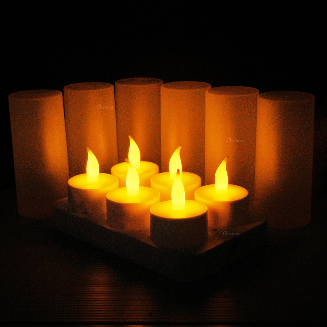 Realistic flickering flameless tea light candles with frosted holders.