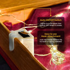 Fairy light unit with built-in hook for easy installation in hamper or gift box.