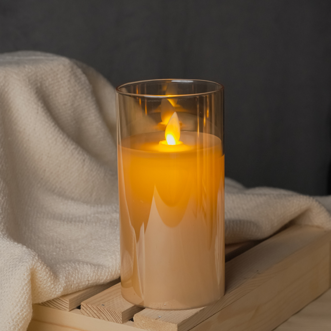 Elegant golden glass LED pillar candle with flickering flame for weddings
