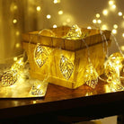 Elegant metal leaf decorative string lights with warm white LEDs for home décor